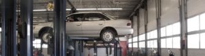 Car on the hoist being tested and inspected